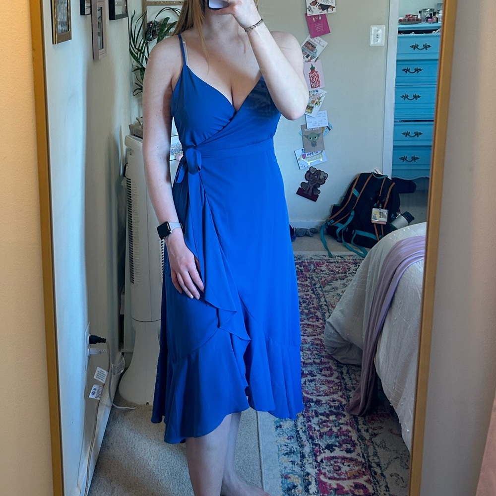 Lulu’s. M. Manhattan Sleeveless wrap-dress.